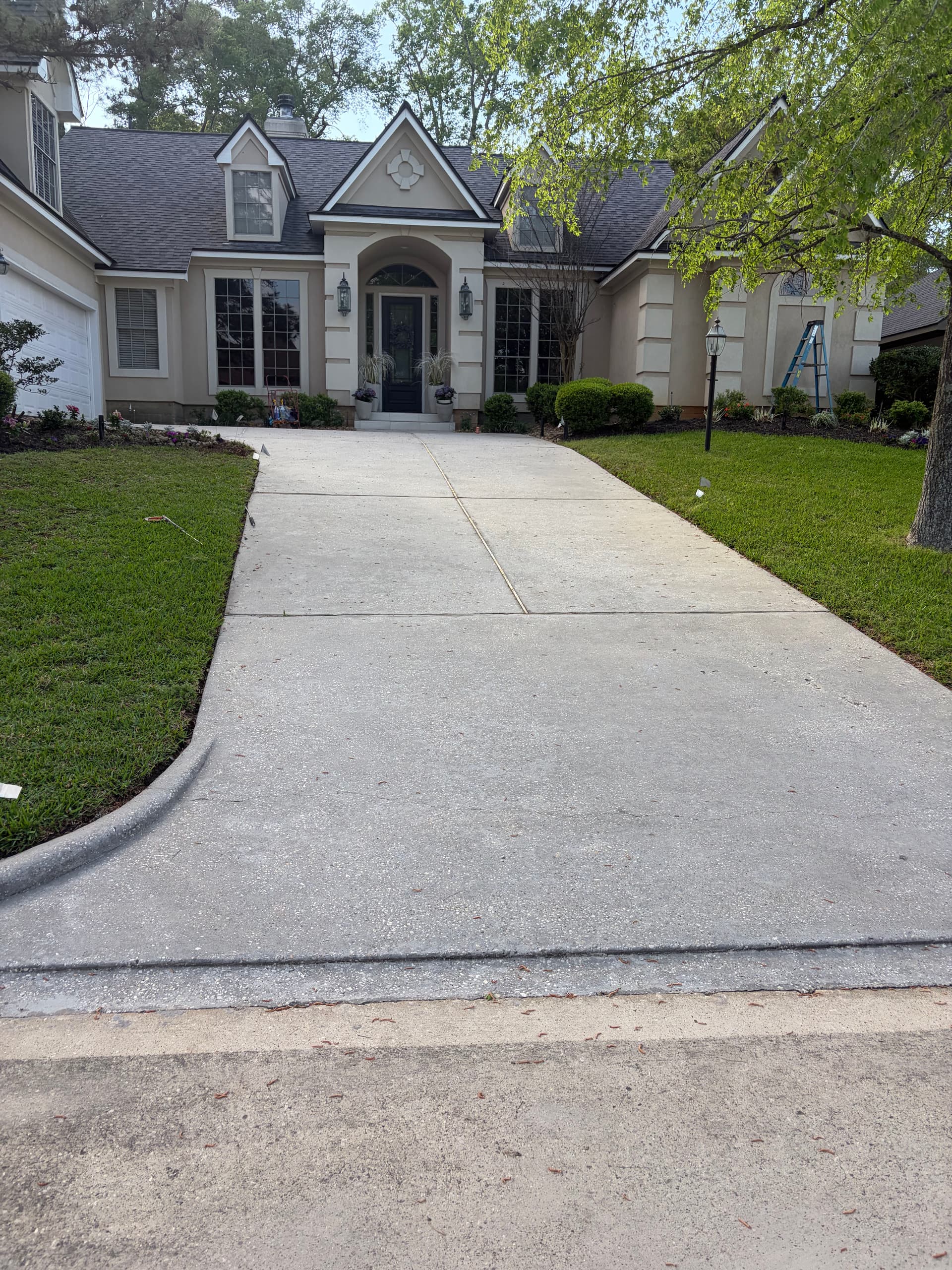 House Exterior Shine with Expert Driveway Cleaning image
